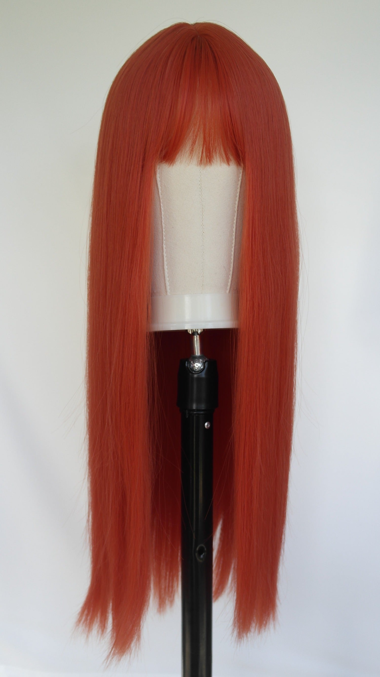 Coral Orange Red Long Wig With Blunt Cut Fringe From Harleyco Wigs NZ | Free NZ Shipping | Buy Now Pay Later Hair With Afterpay and Laybuy