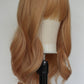 Peachy Pastel Blonde Fringed Wig